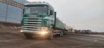 Перевозка колец для колодцев гидроманипулятором в Минске — услуги грузоподъемностью до 40 тонн