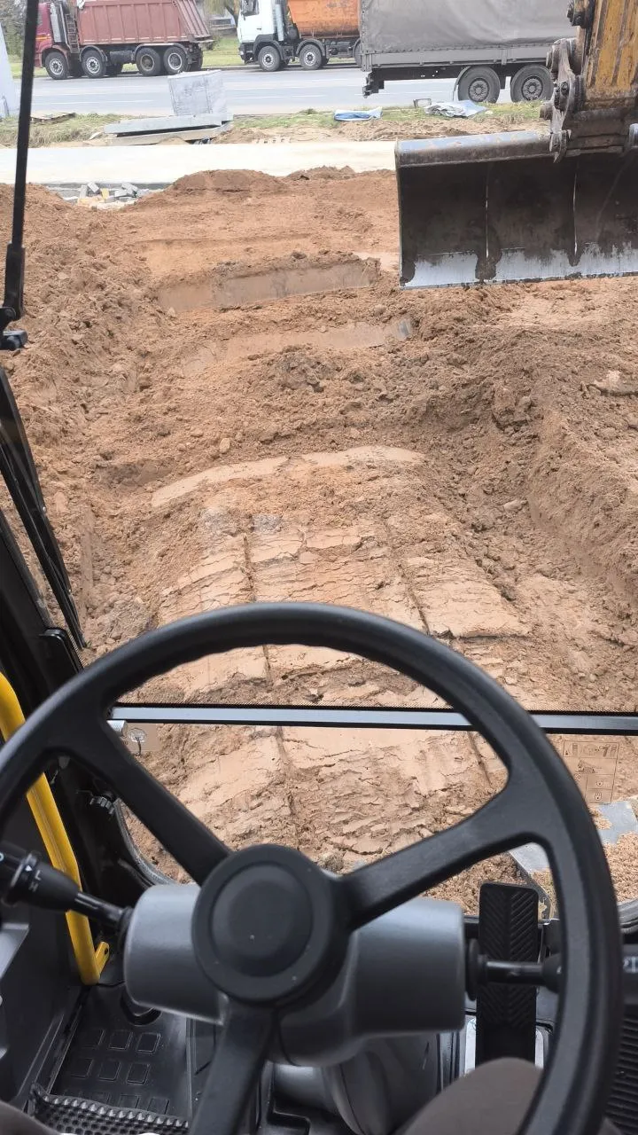 Земельные и буровые работы колесным полноповоротным экскаватором в Бобруйске и районе. 4