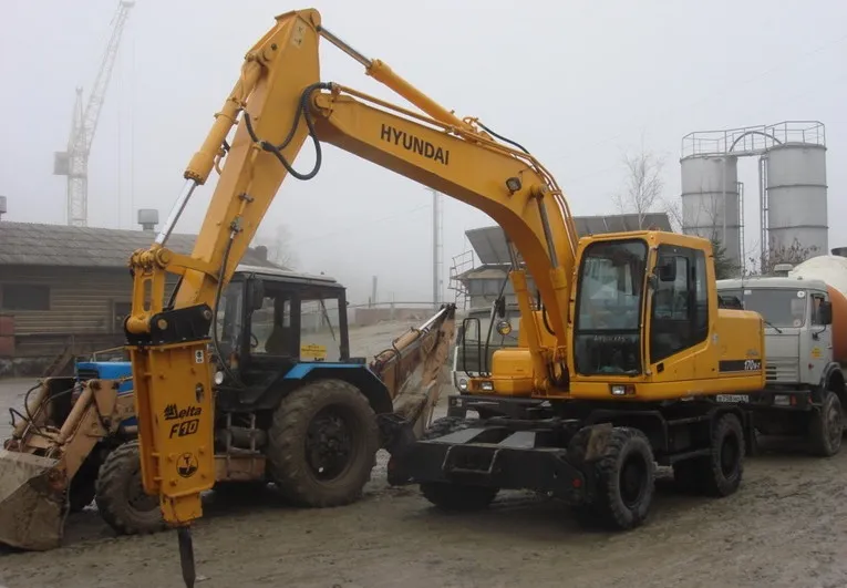 Аренда колесного экскаватора с гидромолотом. 2