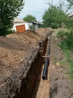 Рытьё траншеи под водопровод Беларусь. 1