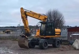 Аренда колесного экскаватора 12,9 т JCB JS145W в Бресте. 1