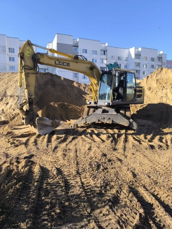 Земельные и буровые работы колесным полноповоротным экскаватором в Бобруйске и районе