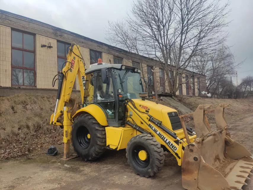 Экскаватор-погрузчик с экипажем New Holland LB110B в аренду. 1 Экскаватор-погрузчик с экипажем New Holland LB110B в аренду. 1