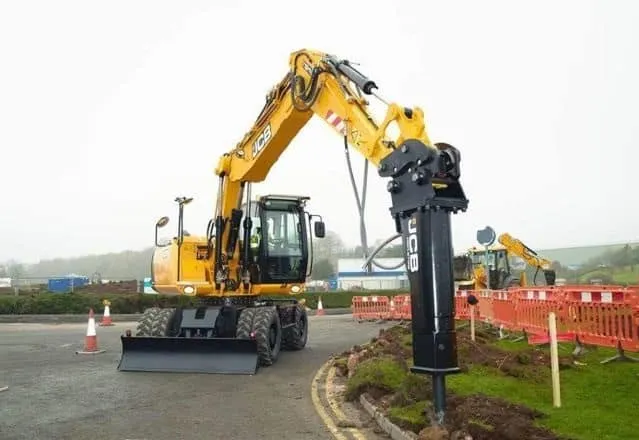 Аренда колесного экскаватора с гидромолотом. 1