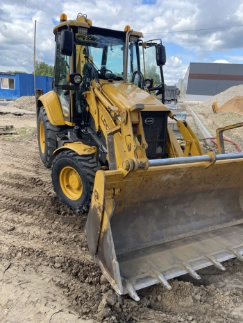 Услуги экскаватора-погрузчика