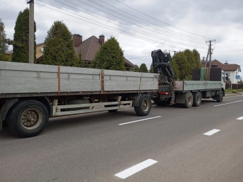 Аренда манипулятора с прицепом в Минске — доставка и монтаж грузов